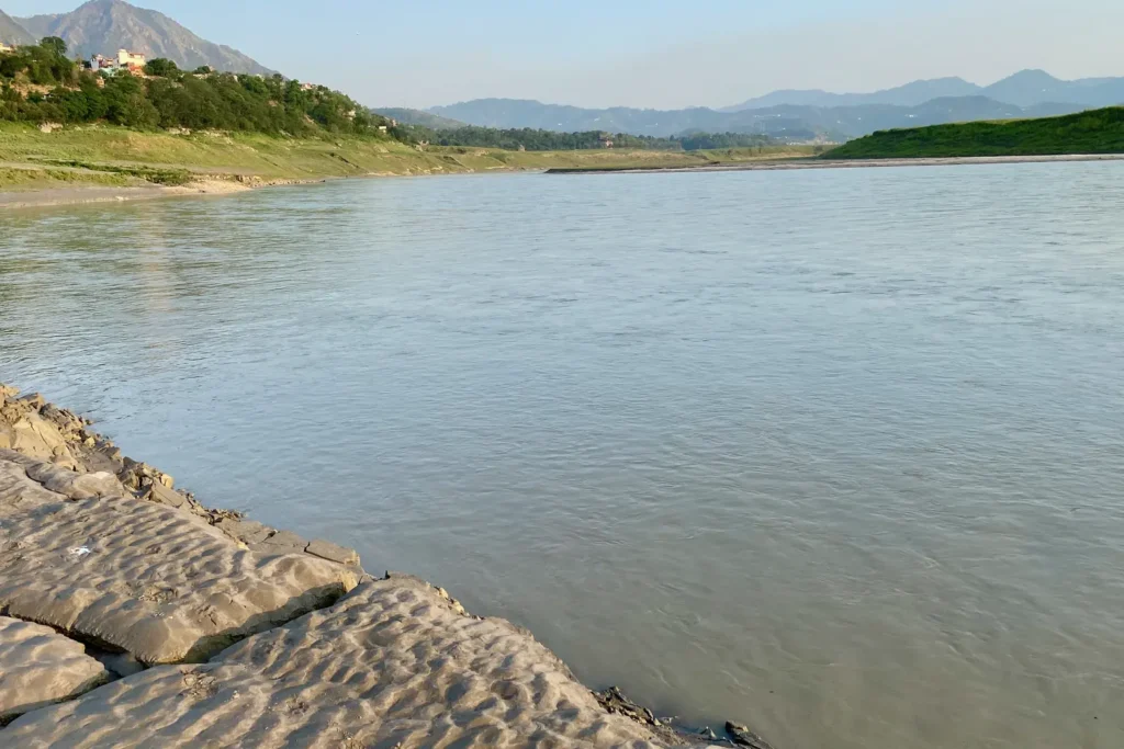 Gobind Sagar reservoir surrounded by hills in Bilaspur, Himachal Pradesh.